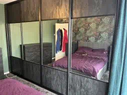 Charcoal flow wood 1/4 - 1/2 - 1/4 split with mirror fitted in Acklam